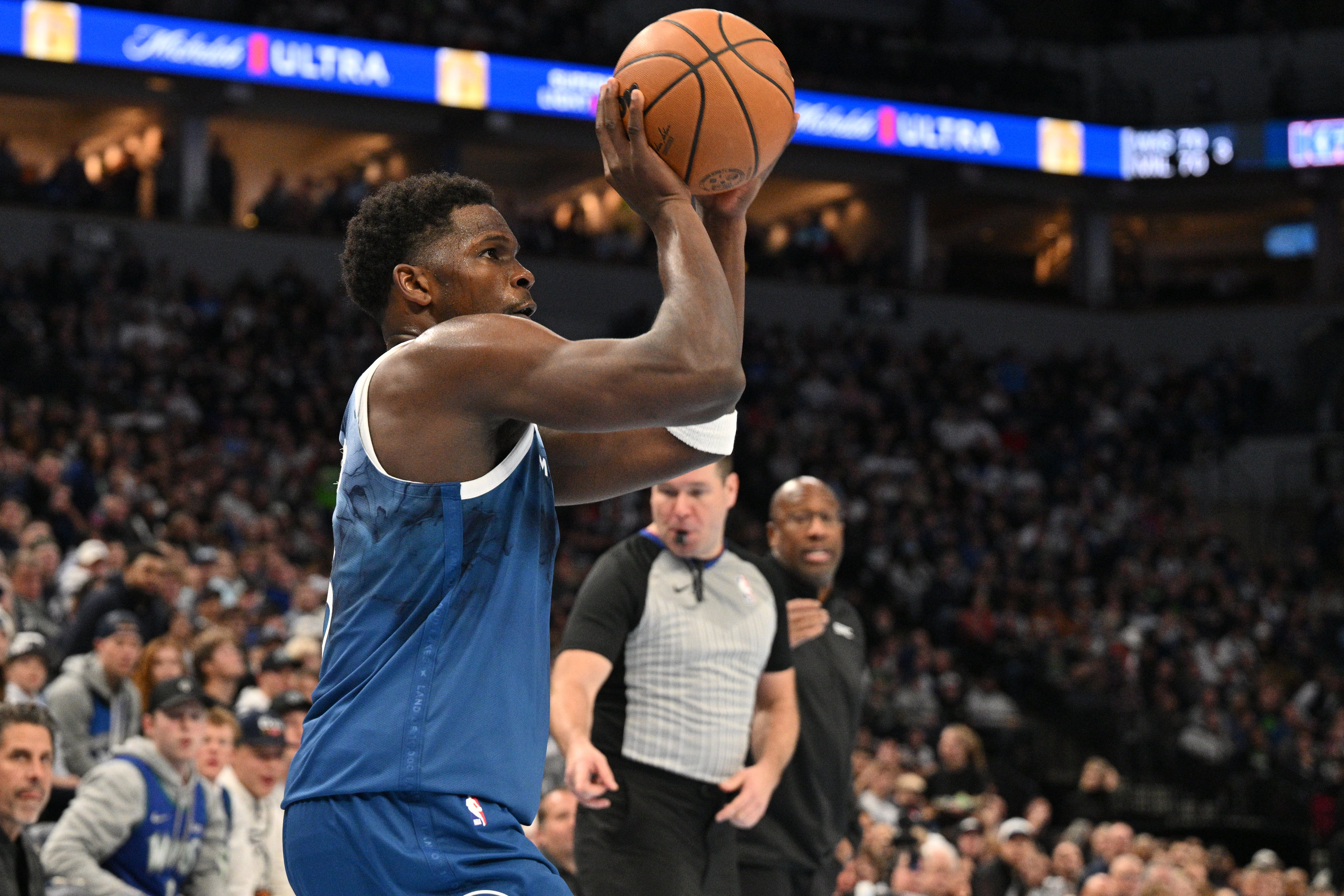 Nov 24, 2023; Minneapolis, Minnesota, USA; Minnesota Timberwolves guard Anthony Edwards (5) shoots the ball against the Sacramento Kings during the third quarter at Target Center.